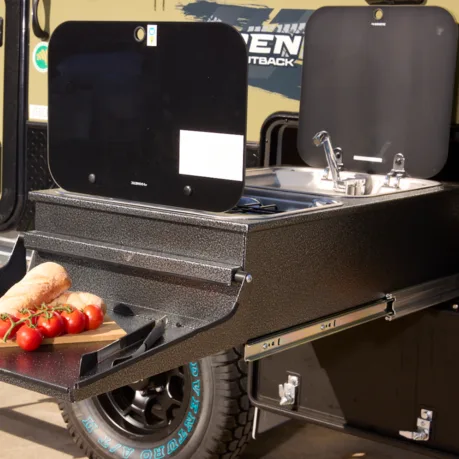 Slide out external kitchen with 2 burner cook top and sink