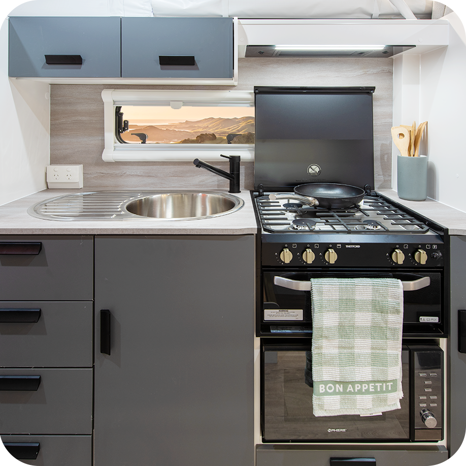 STARCRAFT POP TOP 35 Fully equipped kitchen with Modern kitchen with Rangehood with 12V LED light & twin fans, Microwave and 4 Burner cooktop with built in griller and ample storage