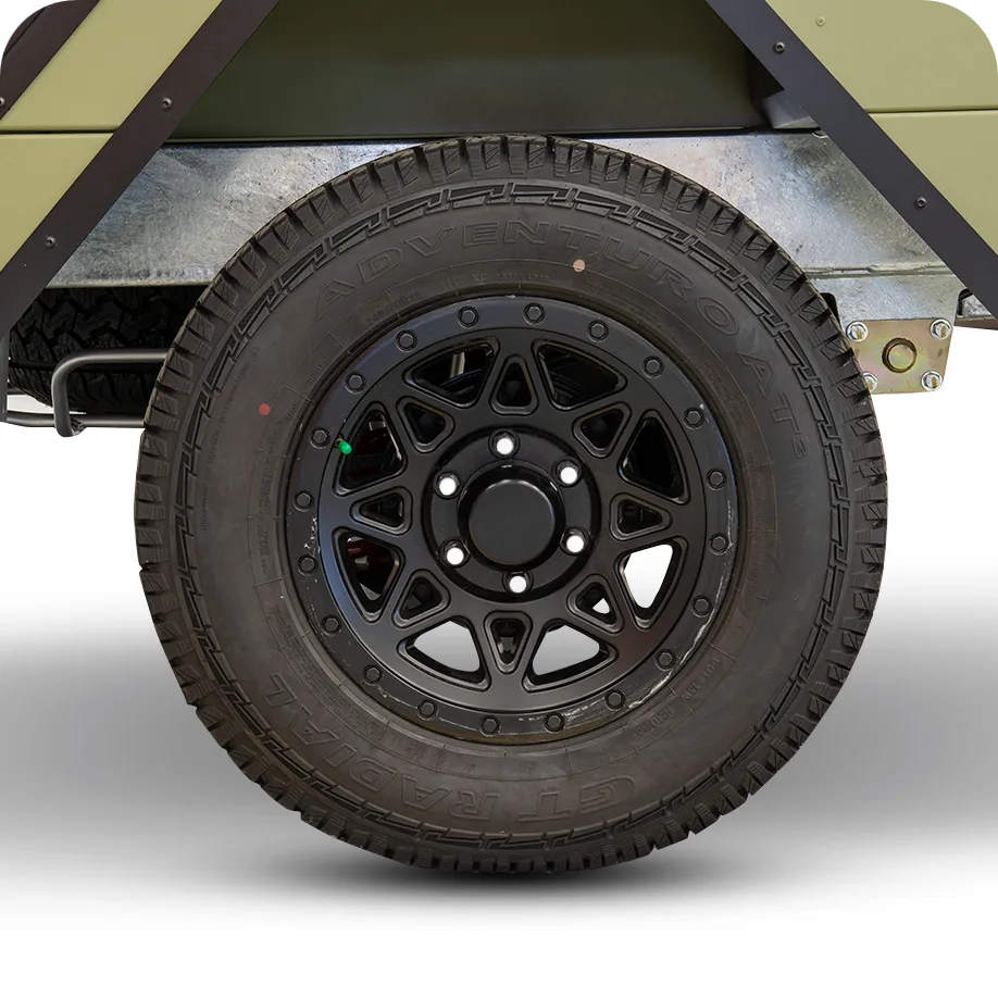 Alloy wheels with wide off-road tyres (including underslung spare)