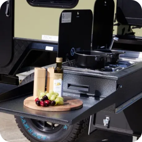 Slide out kitchen with 2 burner cooktop & glass lid sink