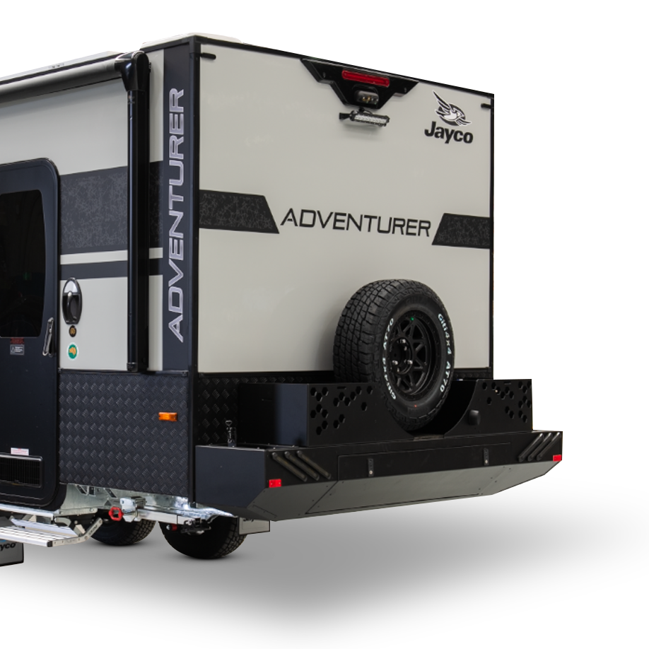 Heavy-duty rear bumper bar with large storage drawer, dual jerrycan holders, dual storage tubs, and spare wheel
