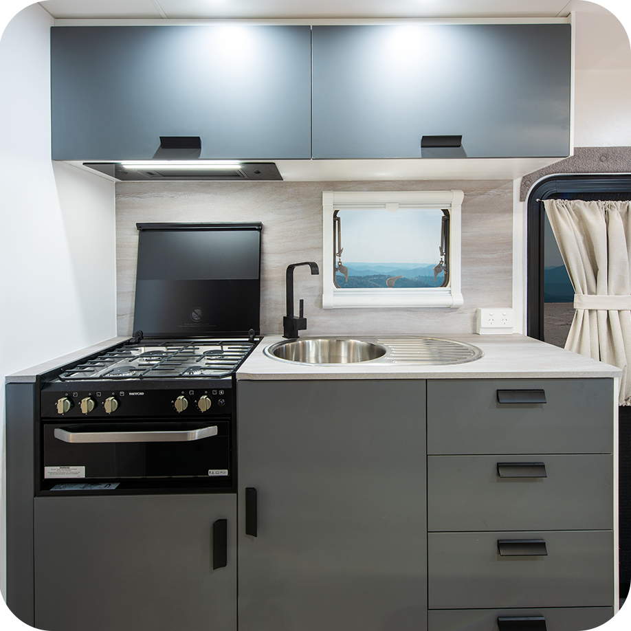 Fully equipped kitchen with Modern kitchen with Rangehood with 12V LED light & twin fans, Microwave and 4 Burner cooktop with built in griller and ample storage