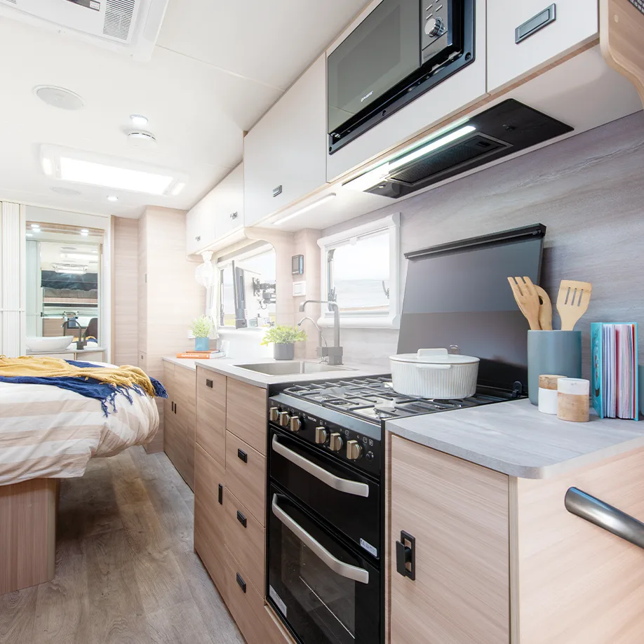 Fully equipped kitchen with 4 burner gas cooktop & grill